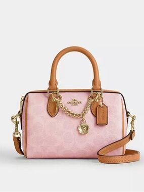 Coach Powder Pink Mini Rowan Crossbody Bag In Signature Canvas With Charms